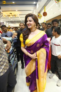 actress honey rose in a violet saree while inaugurating a shopping mall