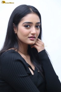 actress Hrithika Srinivas cute in a black top and jeans