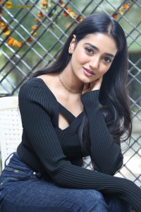 actress Hrithika Srinivas cute in a black top and jeans