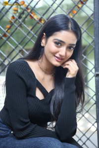 actress Hrithika Srinivas cute in a black top and jeans