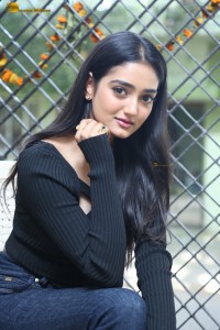 actress Hrithika Srinivas cute in a black top and jeans