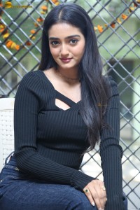 actress Hrithika Srinivas cute in a black top and jeans