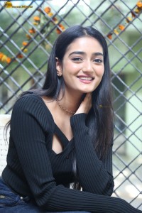 actress Hrithika Srinivas cute in a black top and jeans