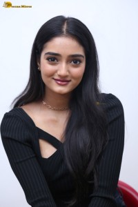 actress Hrithika Srinivas cute in a black top and jeans