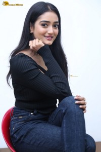 actress Hrithika Srinivas cute in a black top and jeans