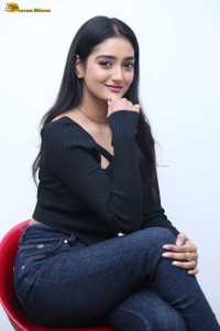 actress Hrithika Srinivas cute in a black top and jeans