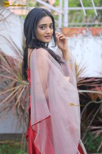 actress hrithika srinivas beautiful in a red salwar dress