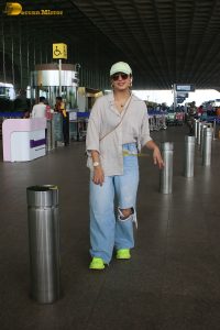 actress Huma Qureshi stylish in a shirt and denim jeans