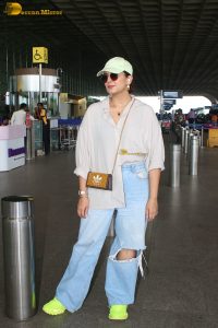 actress Huma Qureshi stylish in a shirt and denim jeans