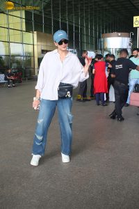 bollywood actress huma qureshi chic look in a shirt and denim jeans