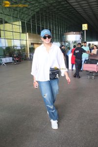 bollywood actress huma qureshi chic look in a shirt and denim jeans