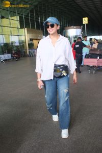 bollywood actress huma qureshi chic look in a shirt and denim jeans