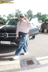 bollywood actress huma qureshi chic look in a shirt and denim jeans