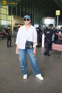 bollywood actress huma qureshi chic look in a shirt and denim jeans