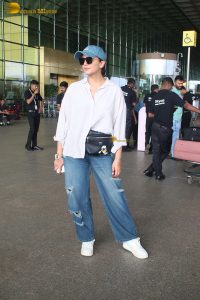 bollywood actress huma qureshi chic look in a shirt and denim jeans