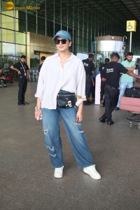 bollywood actress huma qureshi chic look in a shirt and denim jeans