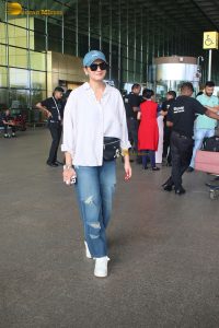 bollywood actress huma qureshi chic look in a shirt and denim jeans