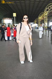 bollywood actress Huma Qureshi in light brown tracks at mumbai airport