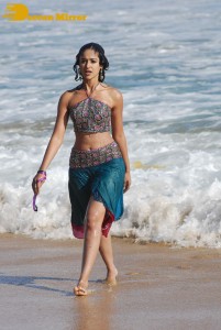 Ileana D’Cruz wet on the beach