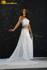 Ileana D’Cruz wearing a white dress and a tiara for a photoshoot