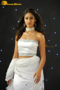 Ileana D’Cruz wearing a white dress and a tiara for a photoshoot