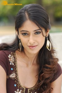 Ileana D’Cruz in a brown top and blue denim jeans