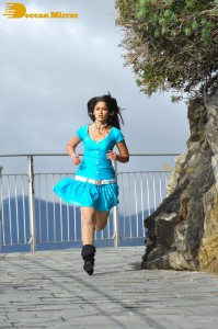 Actress Ileana D’Cruz running in a blue dress