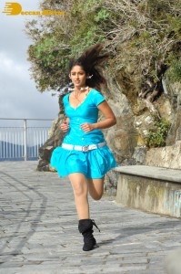 Actress Ileana D’Cruz running in a blue dress