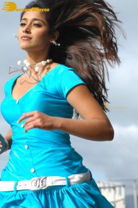 Actress Ileana D’Cruz running in a blue dress