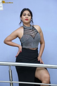 actress Inaya Sultana in a black top and matching skirt