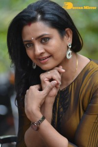 Telugu Actress Indraja in a dark gold color dress