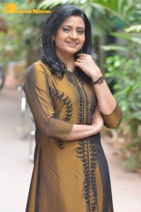 Telugu Actress Indraja in a dark gold color dress