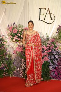actress isha koppikar gorgeous in a orange red saree