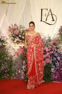 actress isha koppikar gorgeous in a orange red saree