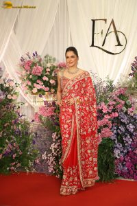actress isha koppikar gorgeous in a orange red saree
