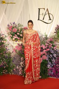actress isha koppikar gorgeous in a orange red saree