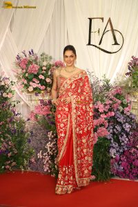 actress isha koppikar gorgeous in a orange red saree