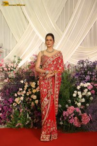 actress isha koppikar gorgeous in a orange red saree