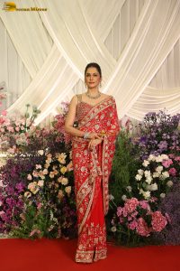 actress isha koppikar gorgeous in a orange red saree