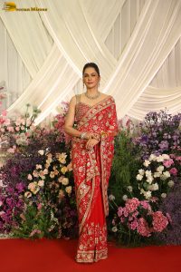 actress isha koppikar gorgeous in a orange red saree