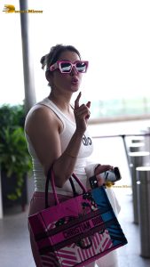 actress isha koppikar sexy in a white top at airport