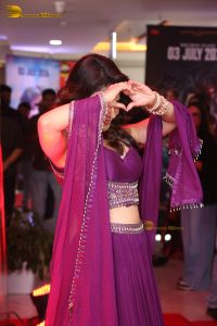 actress Iswarya Menon gorgeous in a pink and purple dress