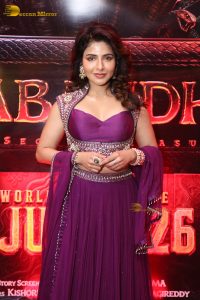 actress Iswarya Menon gorgeous in a pink and purple dress