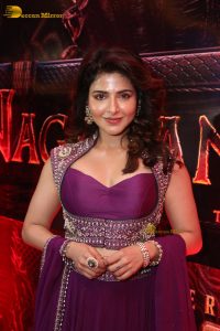 actress Iswarya Menon gorgeous in a pink and purple dress