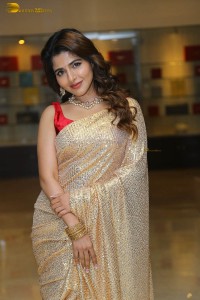 actress iswarya menon stunning hot looks in a shiny gold saree