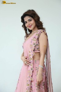 actress iswarya menon beautiful photoshoot in a pink dress