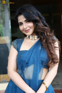 actress Iswarya Menon beautiful in a blue dress