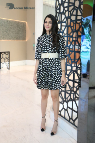 Brazilian Model and Telugu Actress Izabelle Leite dressed in black and white