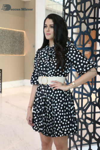 Brazilian Model and Telugu Actress Izabelle Leite dressed in black and white