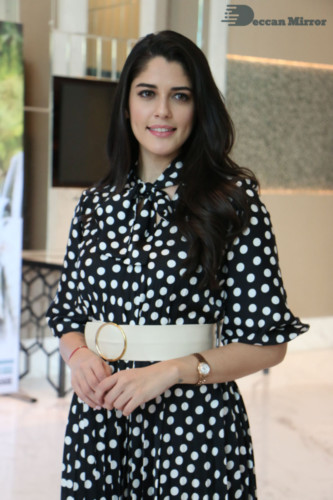 Brazilian Model and Telugu Actress Izabelle Leite dressed in black and white